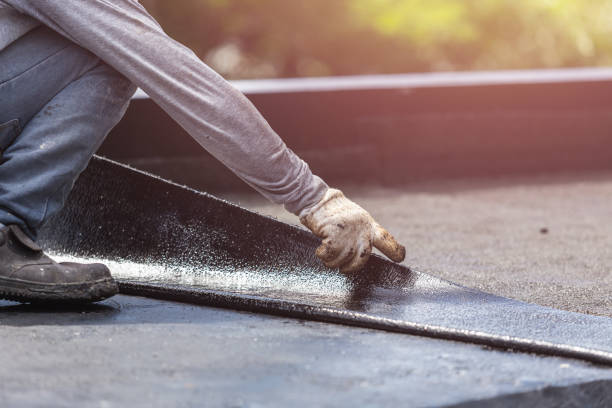 Professional Exterior Waterproofing technician working in Hudson, IL